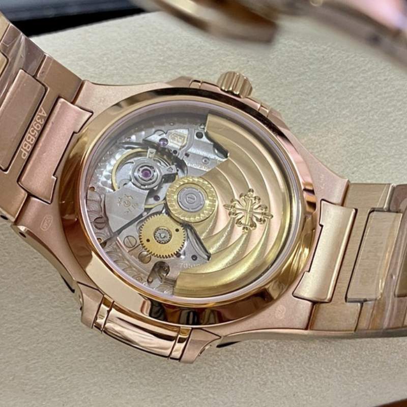 Patek Philippe Nautilus, Gold White Dial